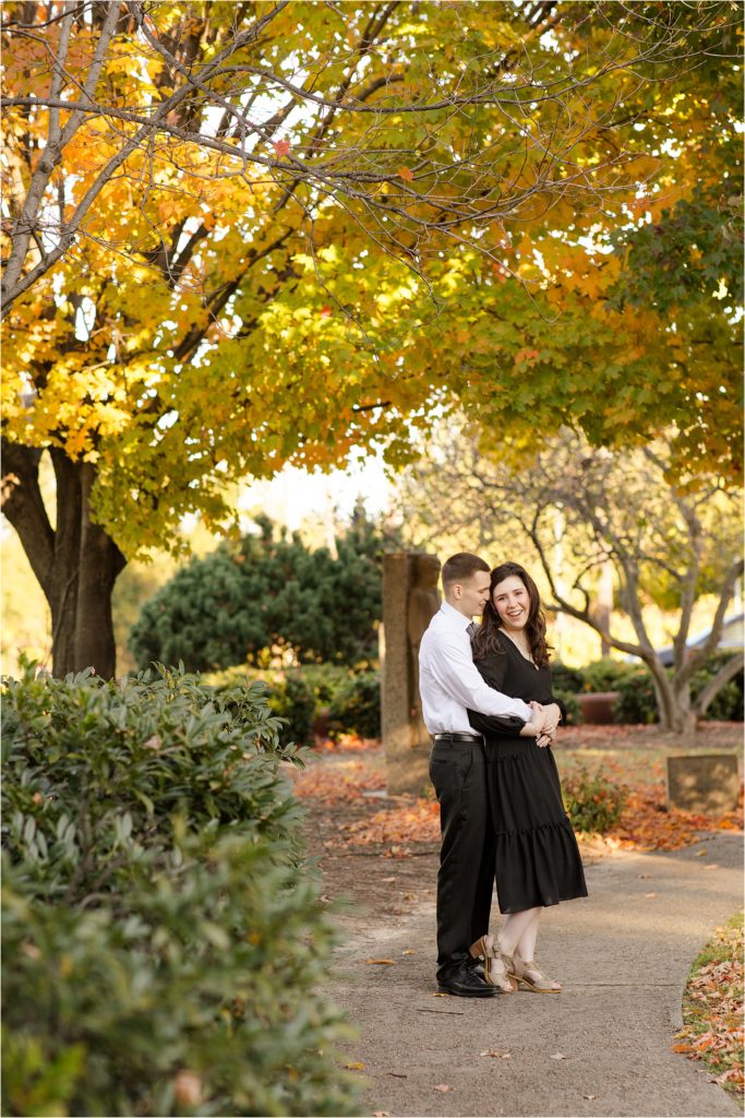 couple laughing fall downtown session